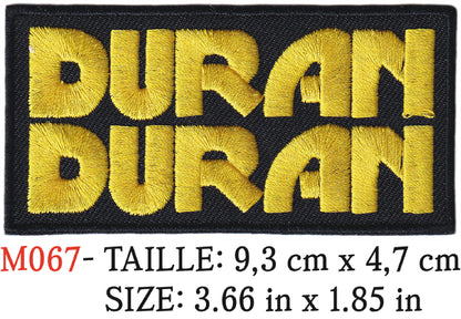 MAXIMUMPATCHES - Écusson Patch Brodé Thermocollant - 9,3 cm x 4,7 cm - Duran Duran Groupe Musique Rock Punk Hard Trash Métal Heavy Psychedelic