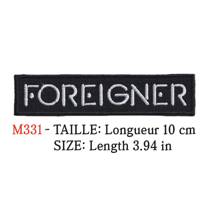 MAXIMUMPATCHES - Ecusson Patch Brodé Thermocollant - Longueur 10 cm - Foreigner Groupe Musique Rock Punk Hard Trash Métal Heavy Psychedelic